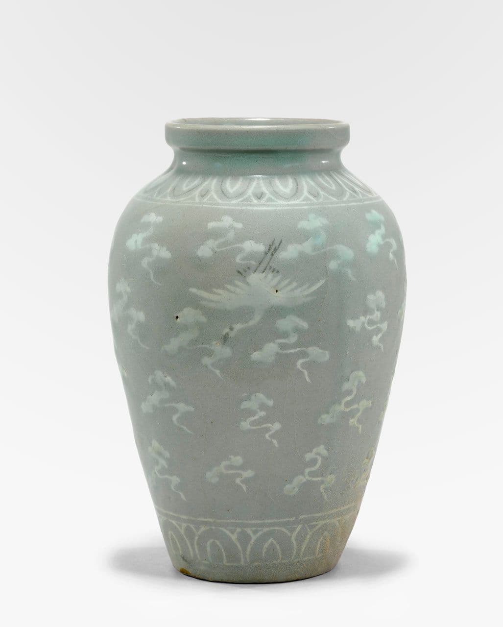 Jar with Cranes and Clouds Design