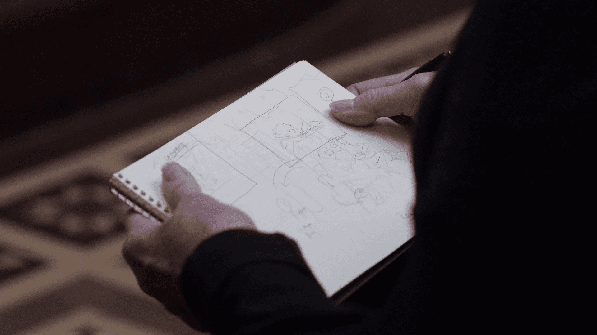 Fig. 7: Gladys Nilsson sketching in front of "Sunday Morning in the Mines" (1872) by Charles Christian Nahl, Crocker Art Museum, October 2024. Photo: Brian Suhr.