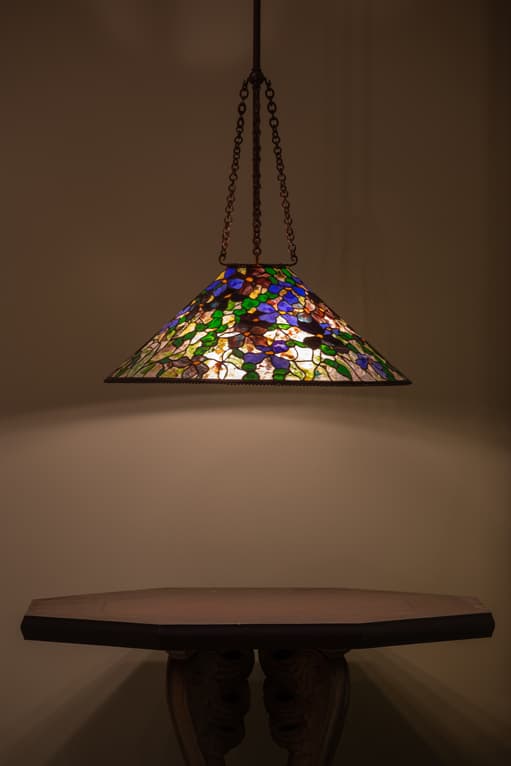 Tiffany Studios (American, 1878–1932), Clematis Hanging Lamp, early 20th century. Glass and Bronze, 12 x 30 (diam.) in. Crocker Art Museum, gift of Don Treadway, 2024.68.1.