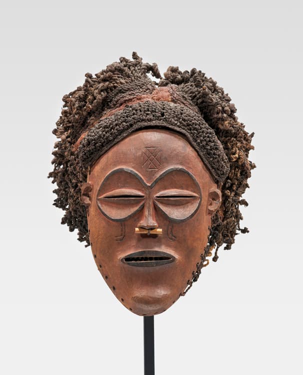 Chokwe people, Angola, Mask (Mwana Pwevo), late 19th–early 20th century. Wood and fiber. Crocker Art Museum, gift of Allan Marion, 2016.37.47.
